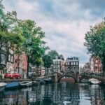 photo of boats parked on river