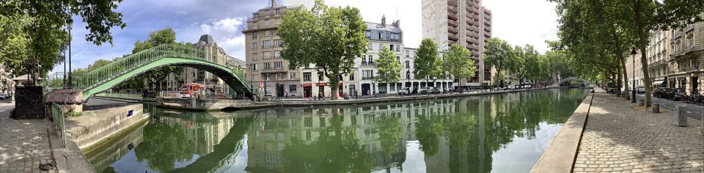 Panorama_of_the_Canal_Saint-Martin-1024x252 🗼15 Razões para Visitar Paris e Se Apaixonar Pela Cidade Luz